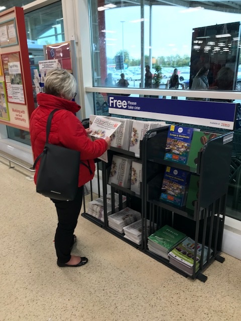 An image showing a news stand being merchandised